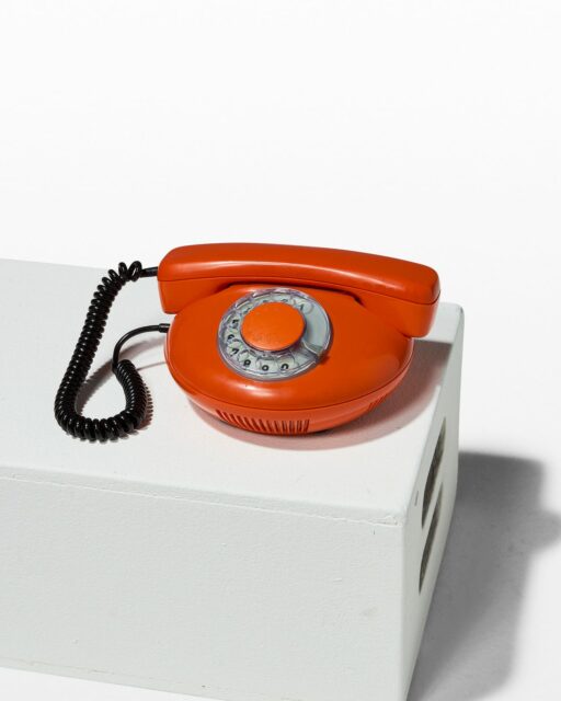 Front view of Ron Orange Rotary Phone