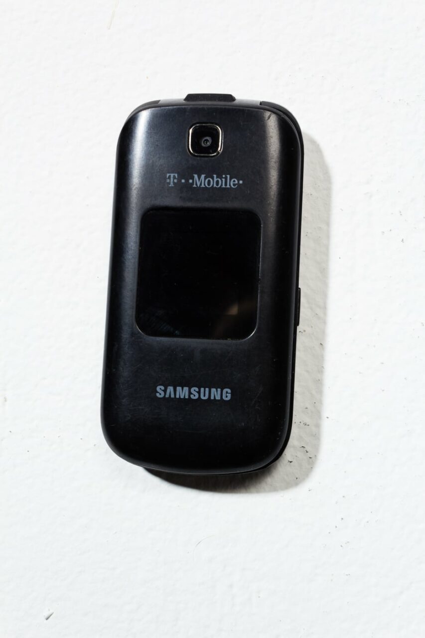 TE066 Black Samsung Flip Phone Prop Rental - ACME Brooklyn