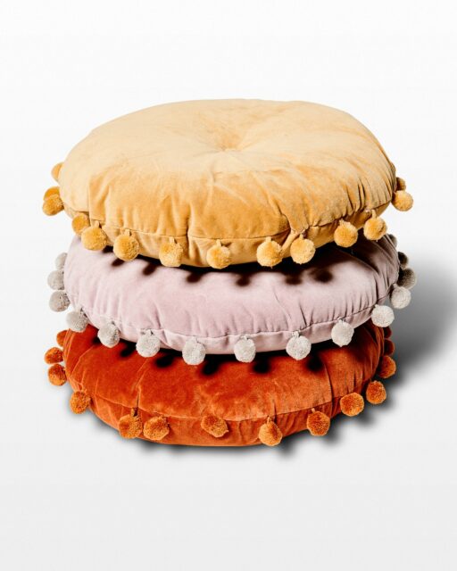 Front view of Pom Pom Pillow Stack