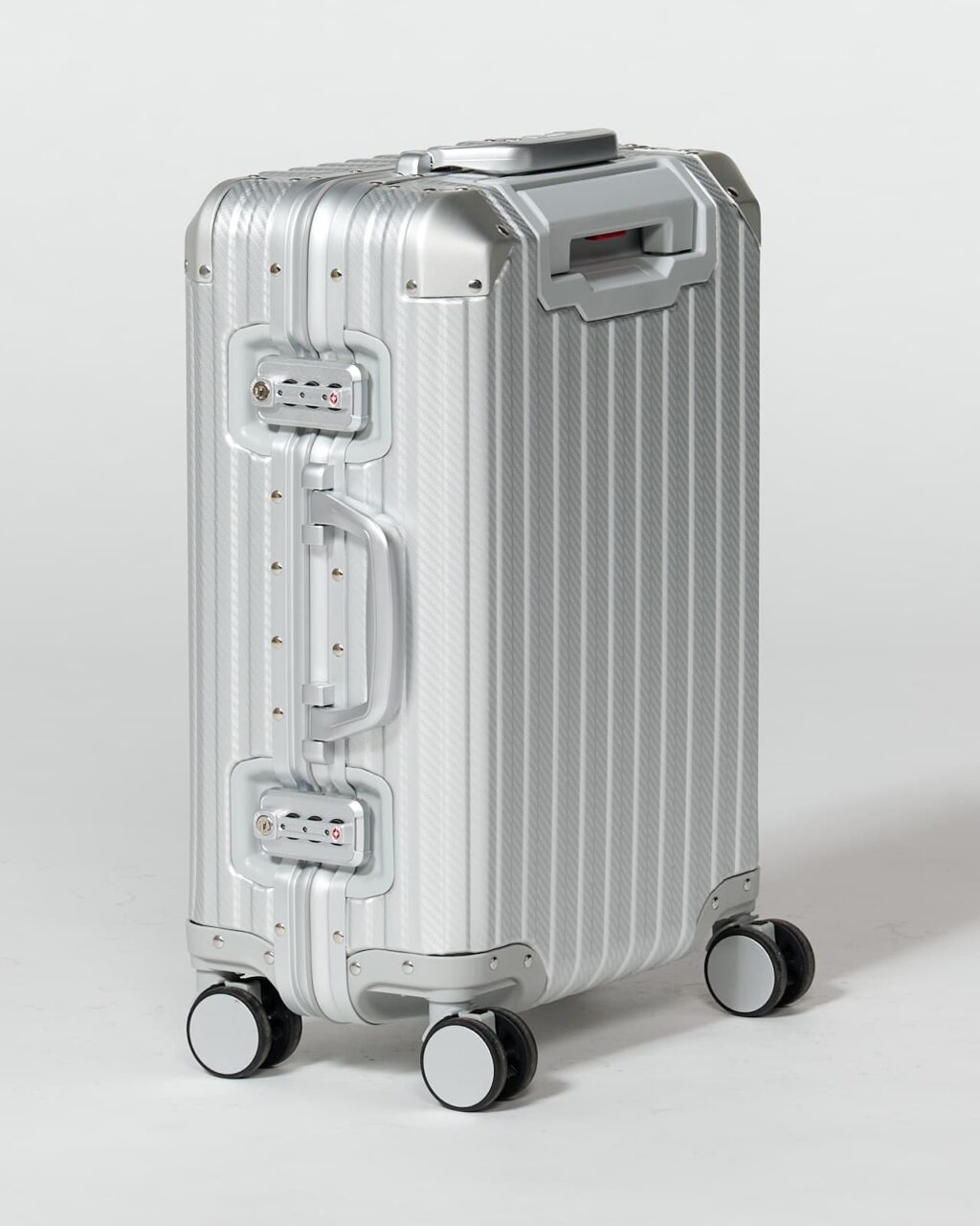 TL172 Dante Small Aluminum Rolling Suitcase Prop Rental - ACME Brooklyn